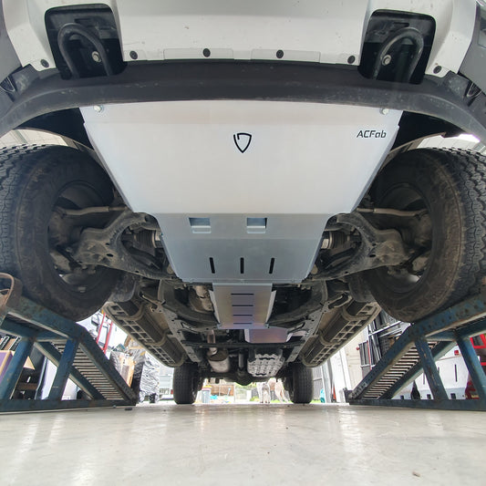 Undercarriage view of a vehicle showing the installed bash plates on the Ford Ranger Next Gen RA 2022+.