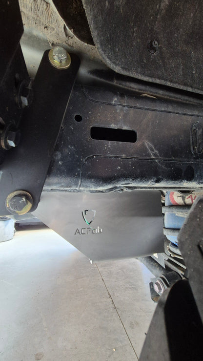 Close-up of a mechanical component with visible branding on a concrete surface